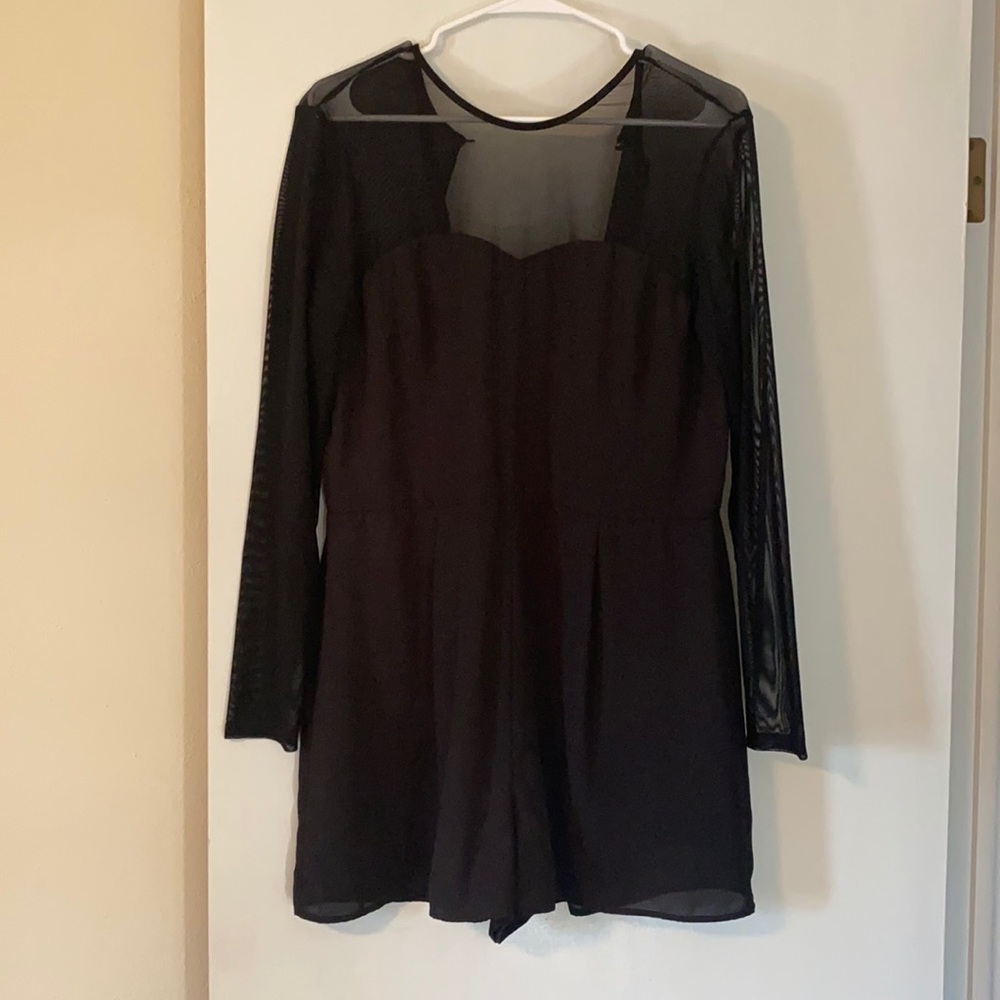 Black sheer long sleeve romper.